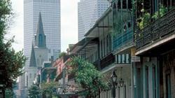 New Orleans French Quarter balconies with St. Louis Cathedral in background